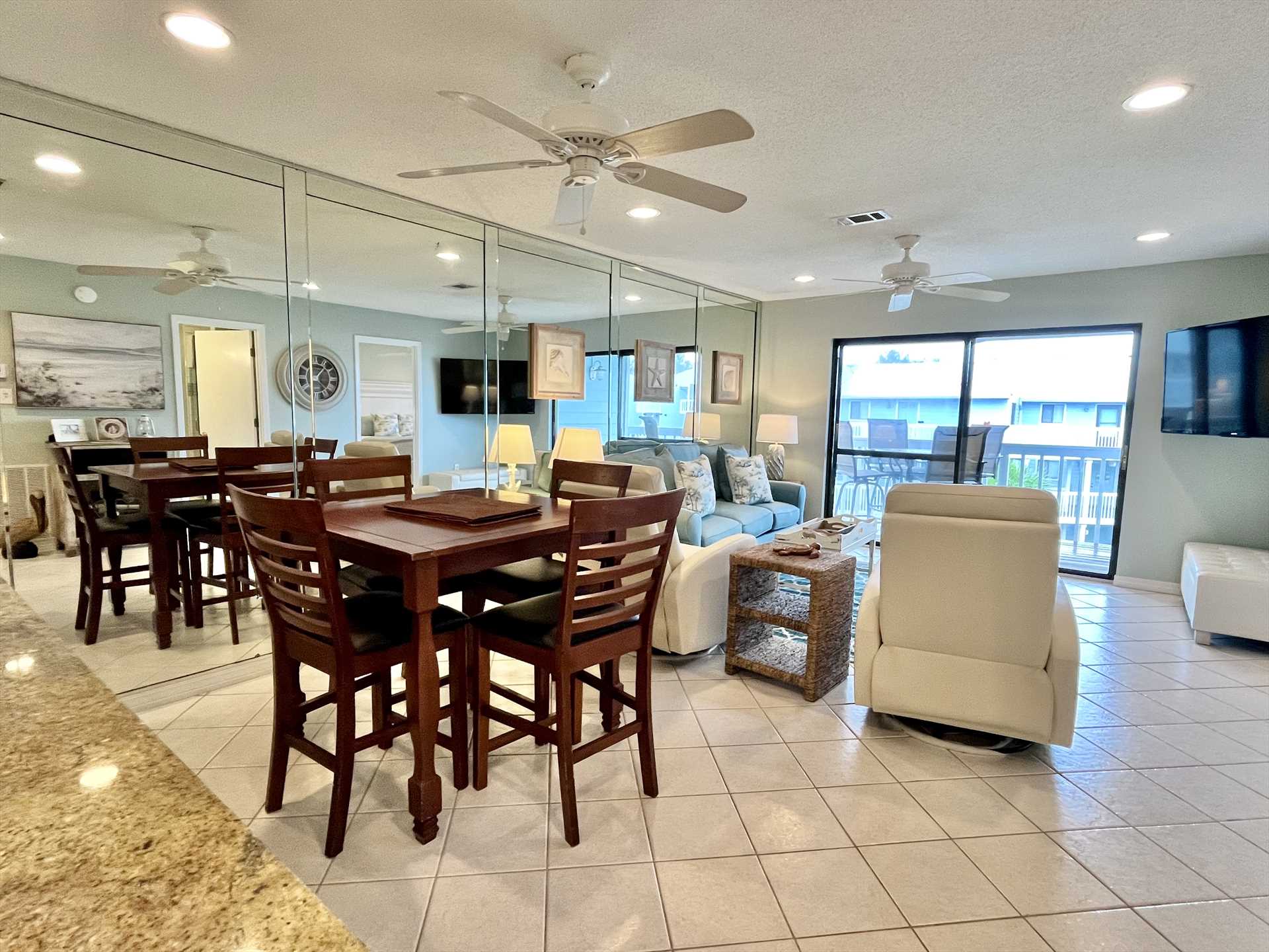 The dining area with table, chairs, 