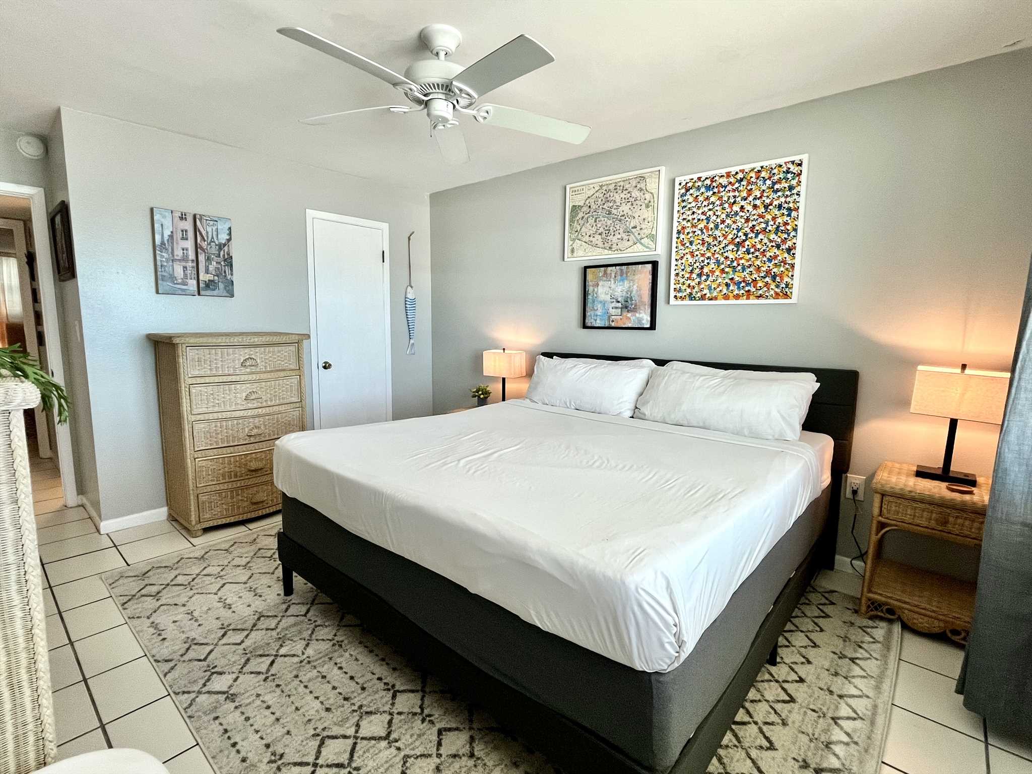 The master bedroom includes a dresser 