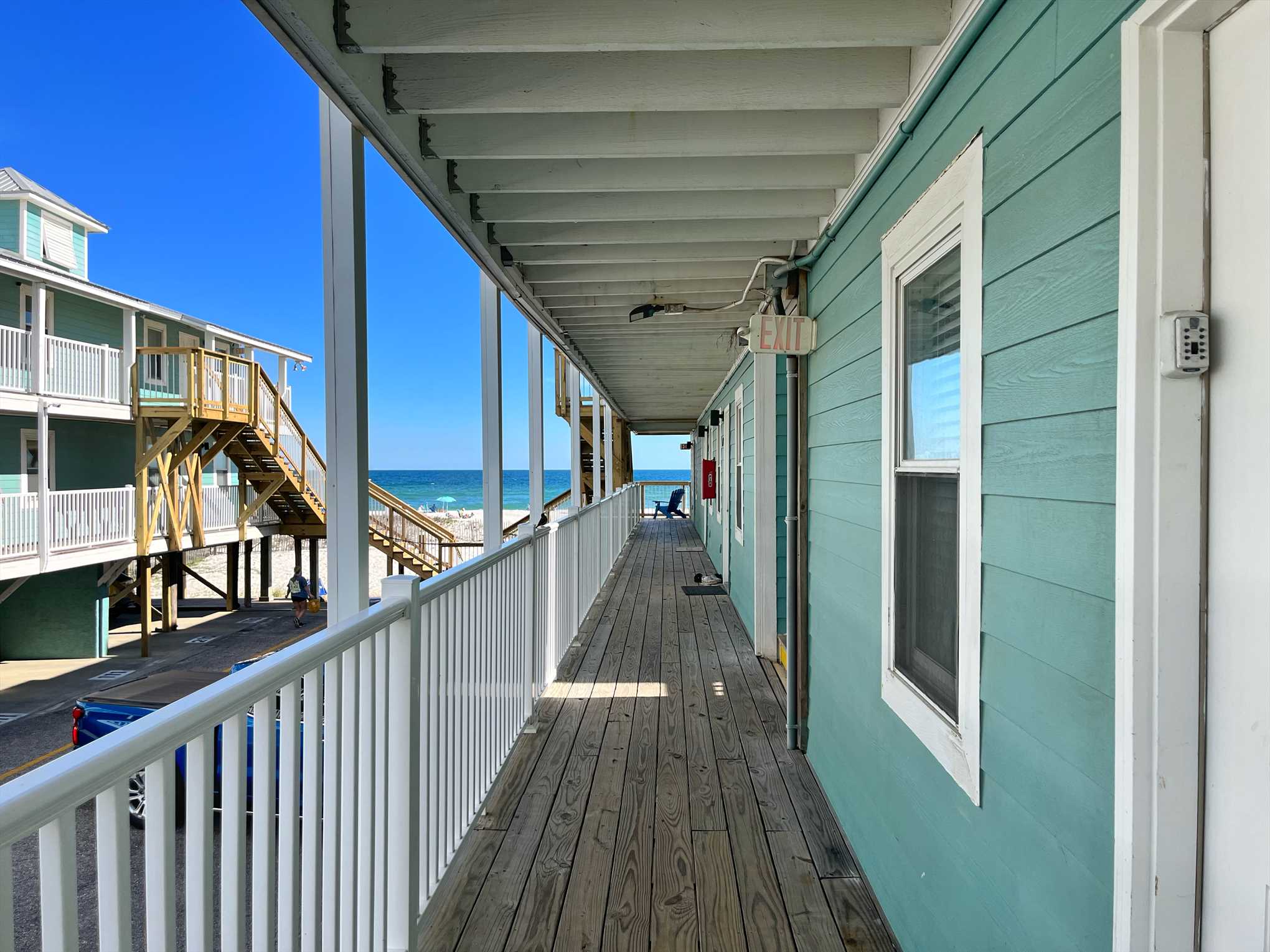 View from breezeway by the entrance of 104. Breezeway leads
