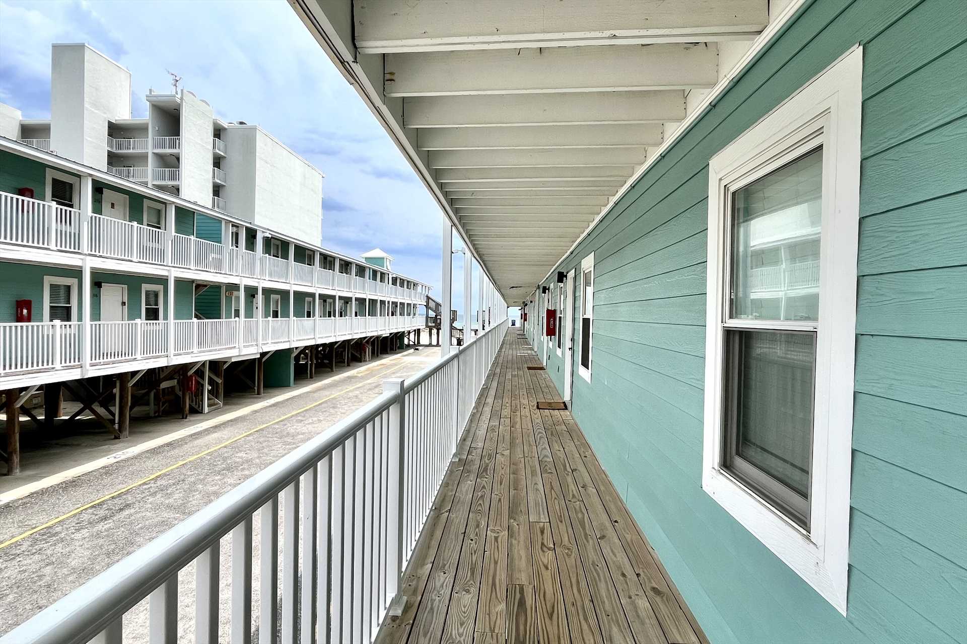 View of the breezeway right outside the entrance door.  A sh