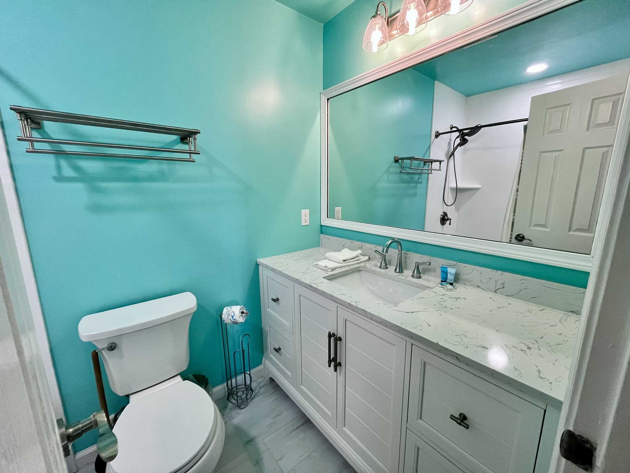 The hall bathroom has a shower/tub combo.