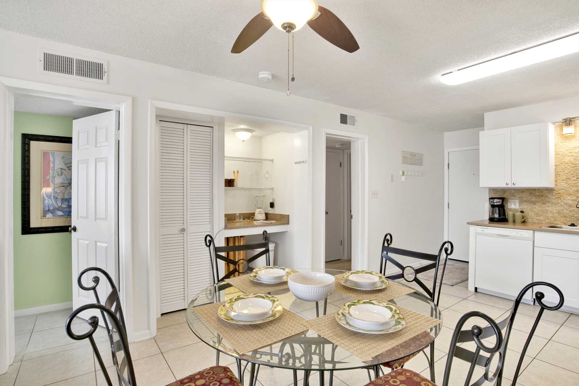 Extra counter and storage space for groceries located by the