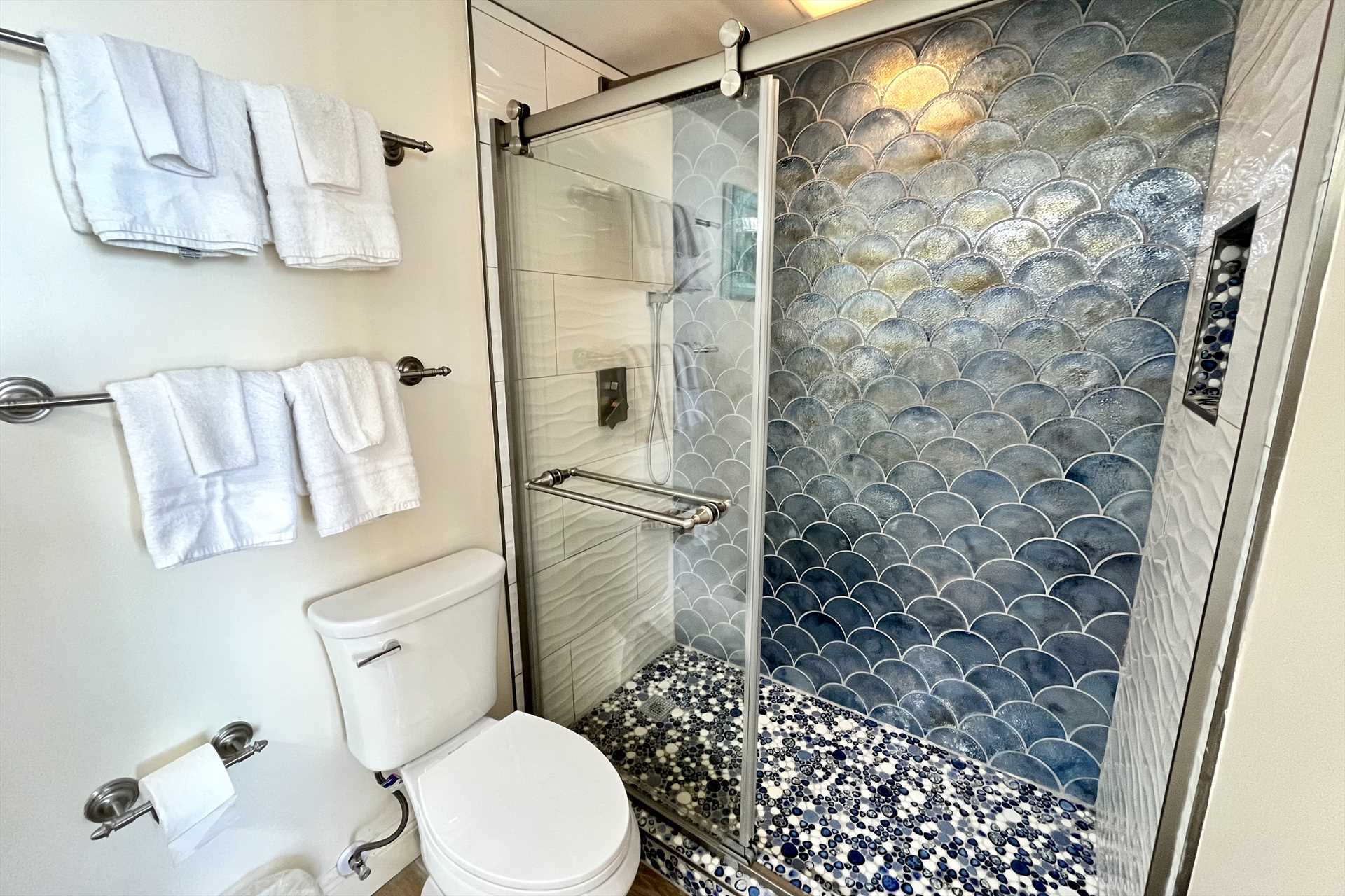 The master bathroom with a custom tiled shower.  How unique!