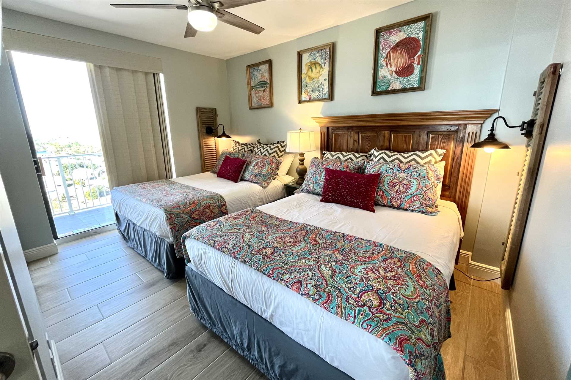 The third bedroom includes two Queen-sized beds.
