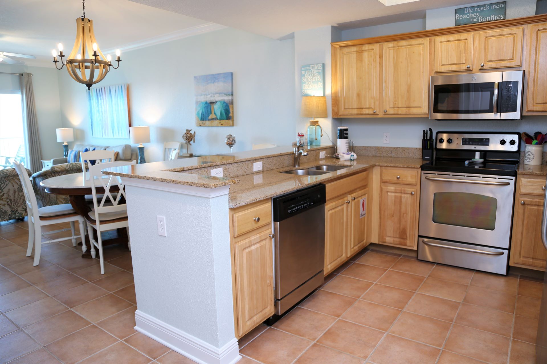 The granite counters provide ample space for prepping home-c