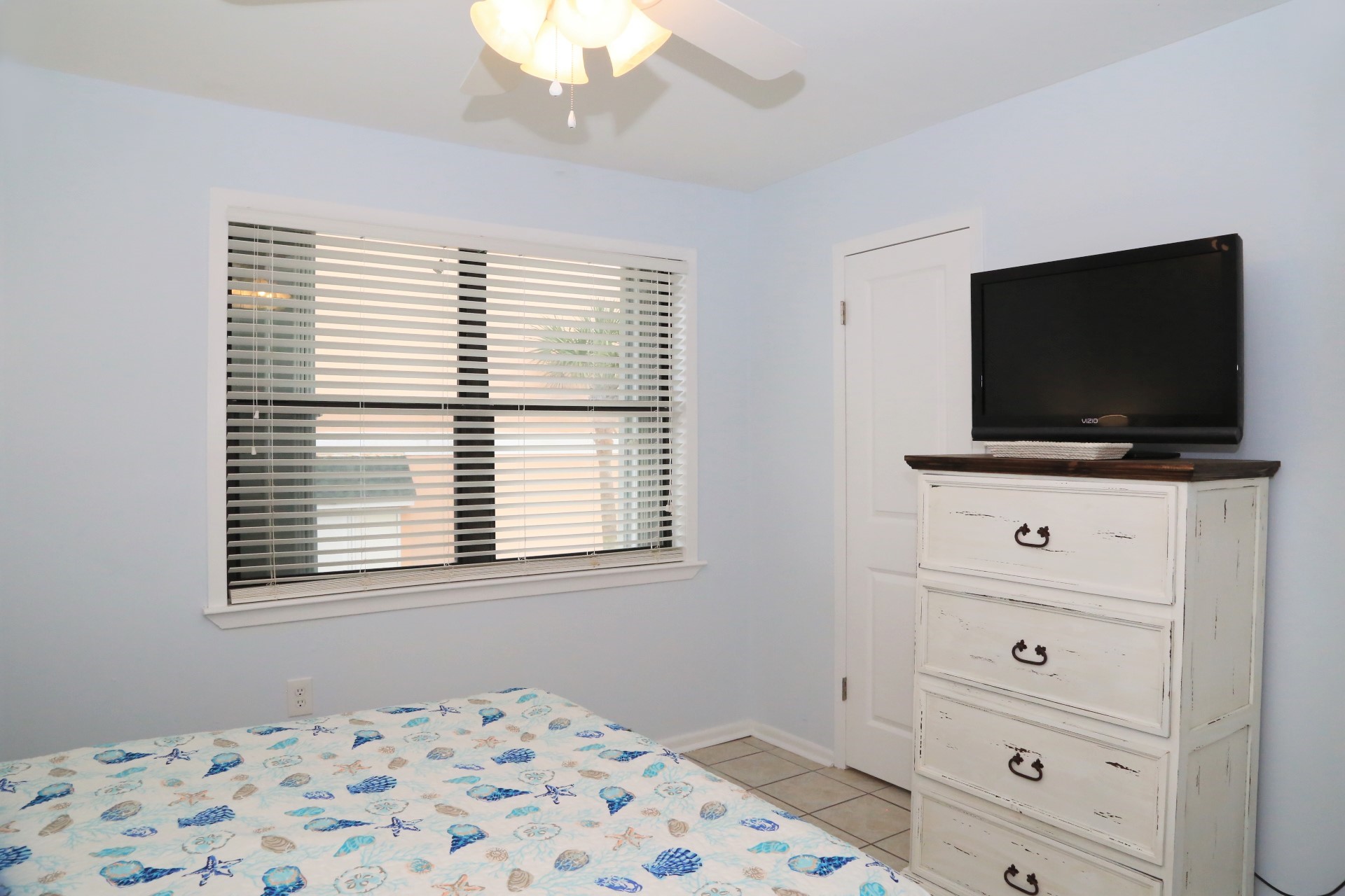 Large, cable TV and closet for storage.