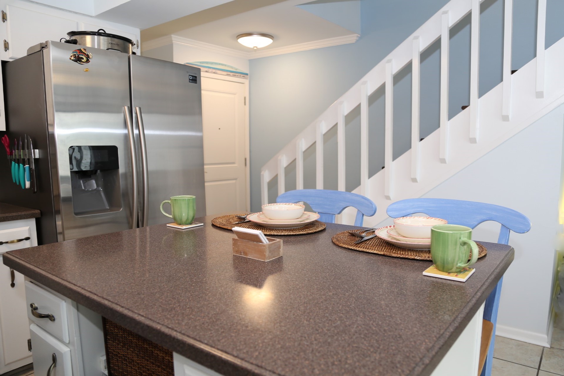 The kitchen island offers extra counter space for prepping m