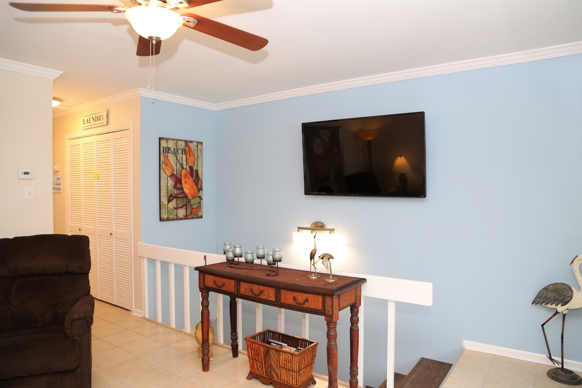 The upstairs living room is the perfect spot to kickback on 