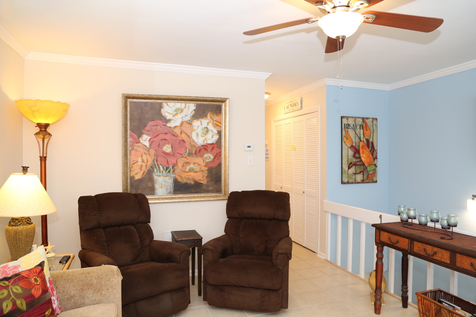 Upstairs living room located at the top of the stairs.