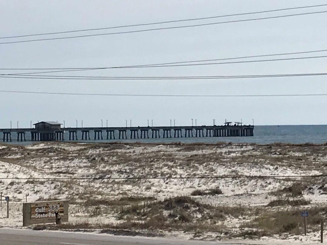 Great view of the fishing pier from your private balcony!