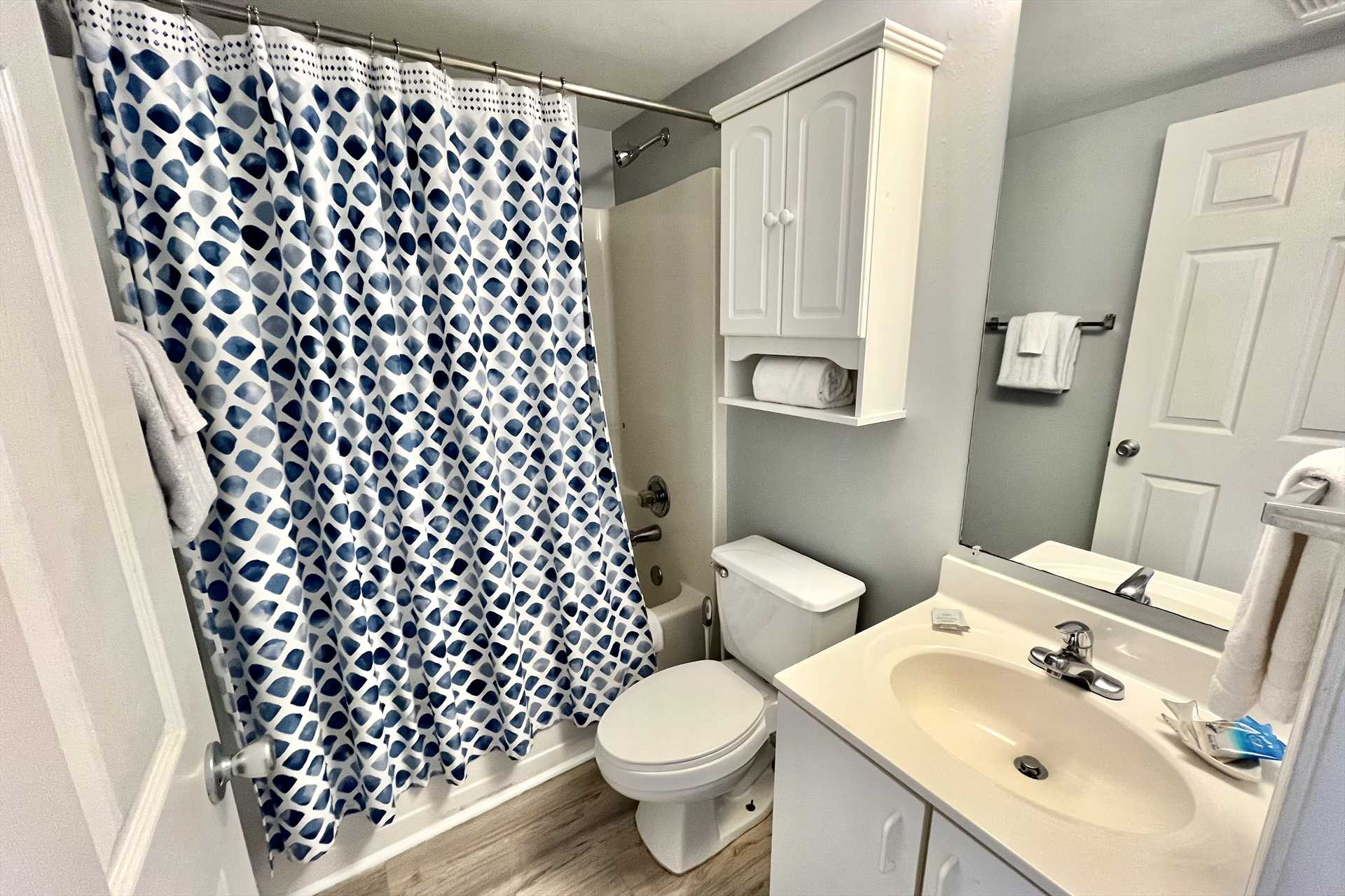 The hall bathroom includes a shower/tub combo plus a starter