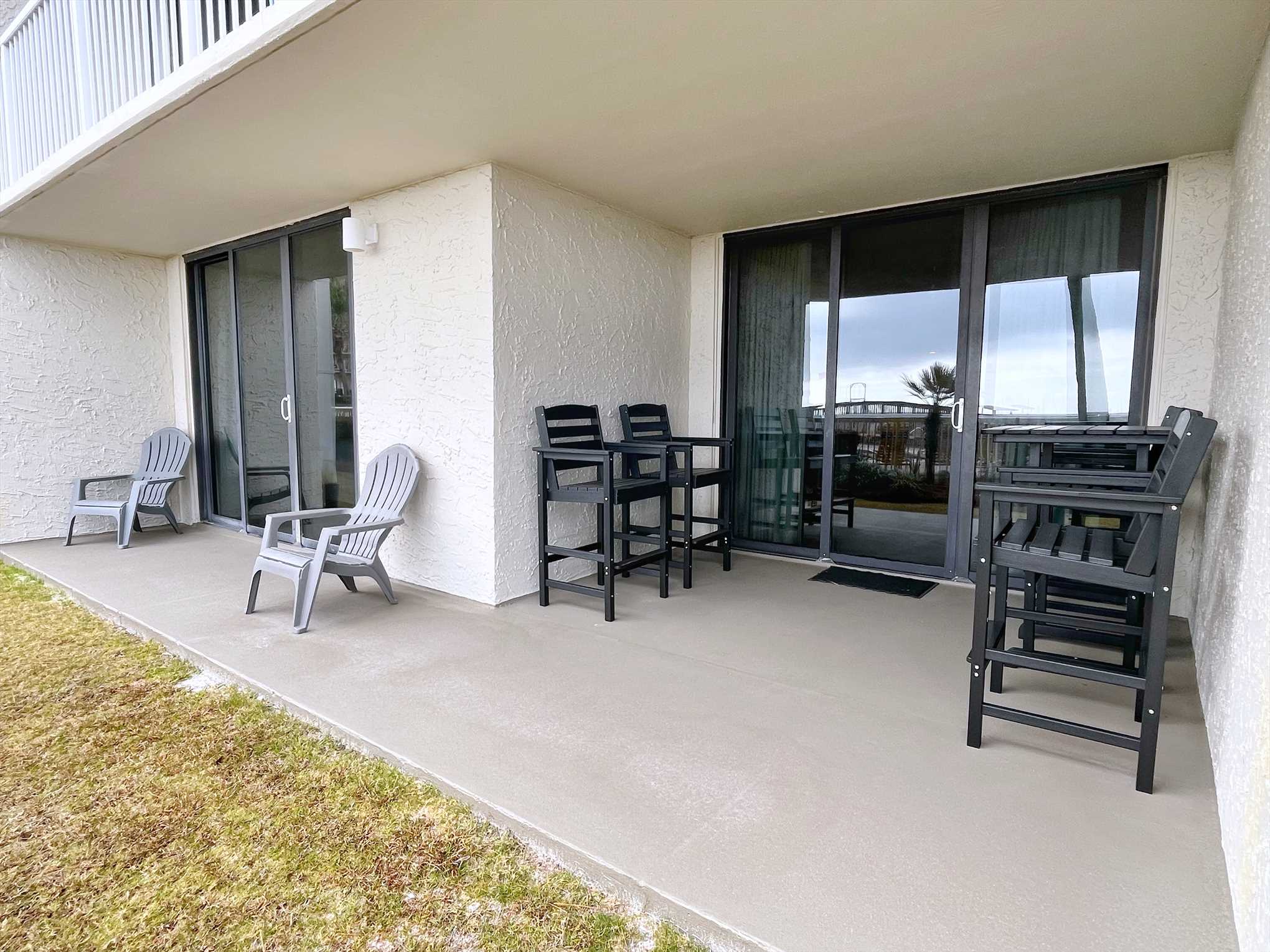 Your ground floor, spacious patio with outdoor table and cha