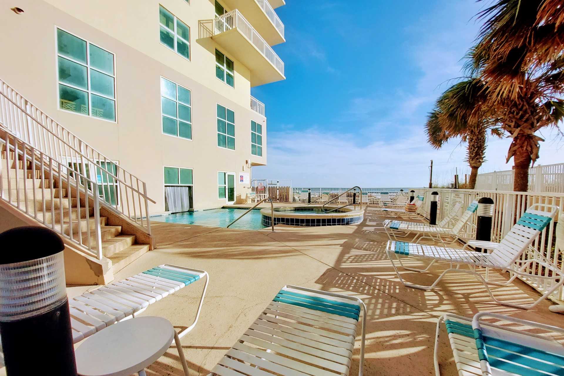 Lounge poolside with a book or maybe a cocktail!