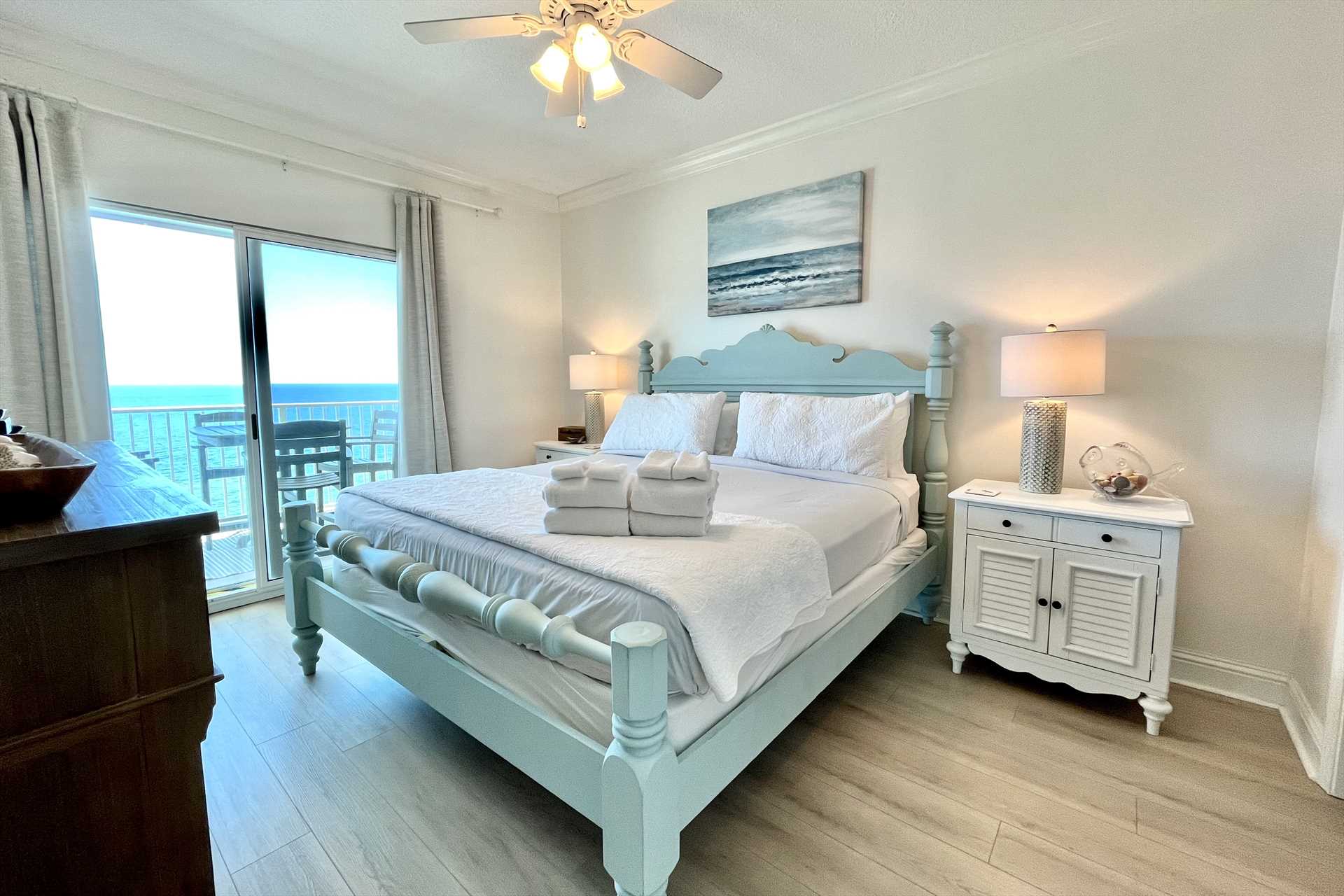 The primary bedroom with king-sized bed.