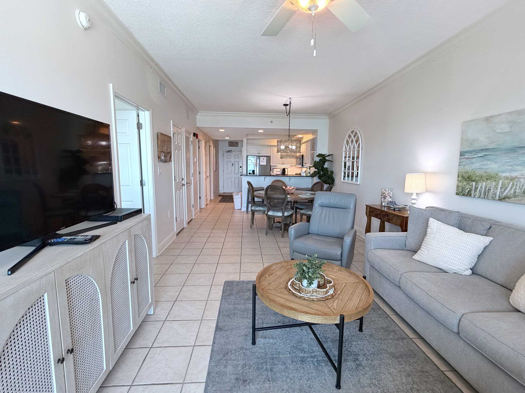 The living room provides ample seating to kickback and relax