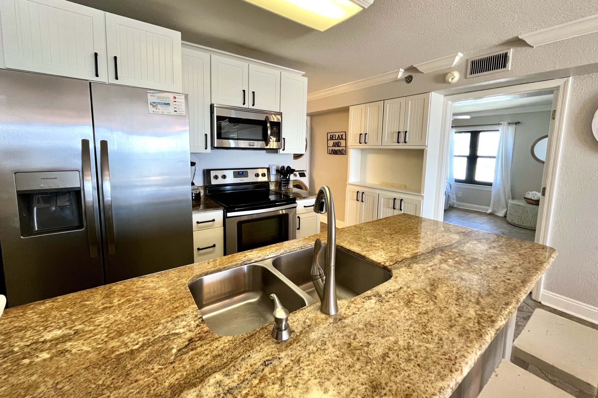 The gorgeous granite counters offer plenty of prep space!