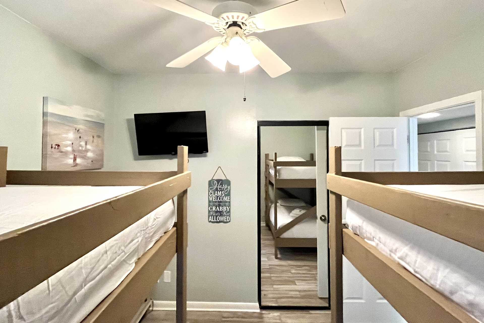 The third bedroom includes a TV.