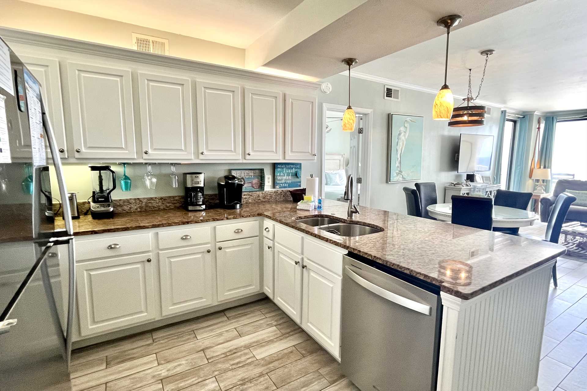 Granite counters and stainless steel appliances.
