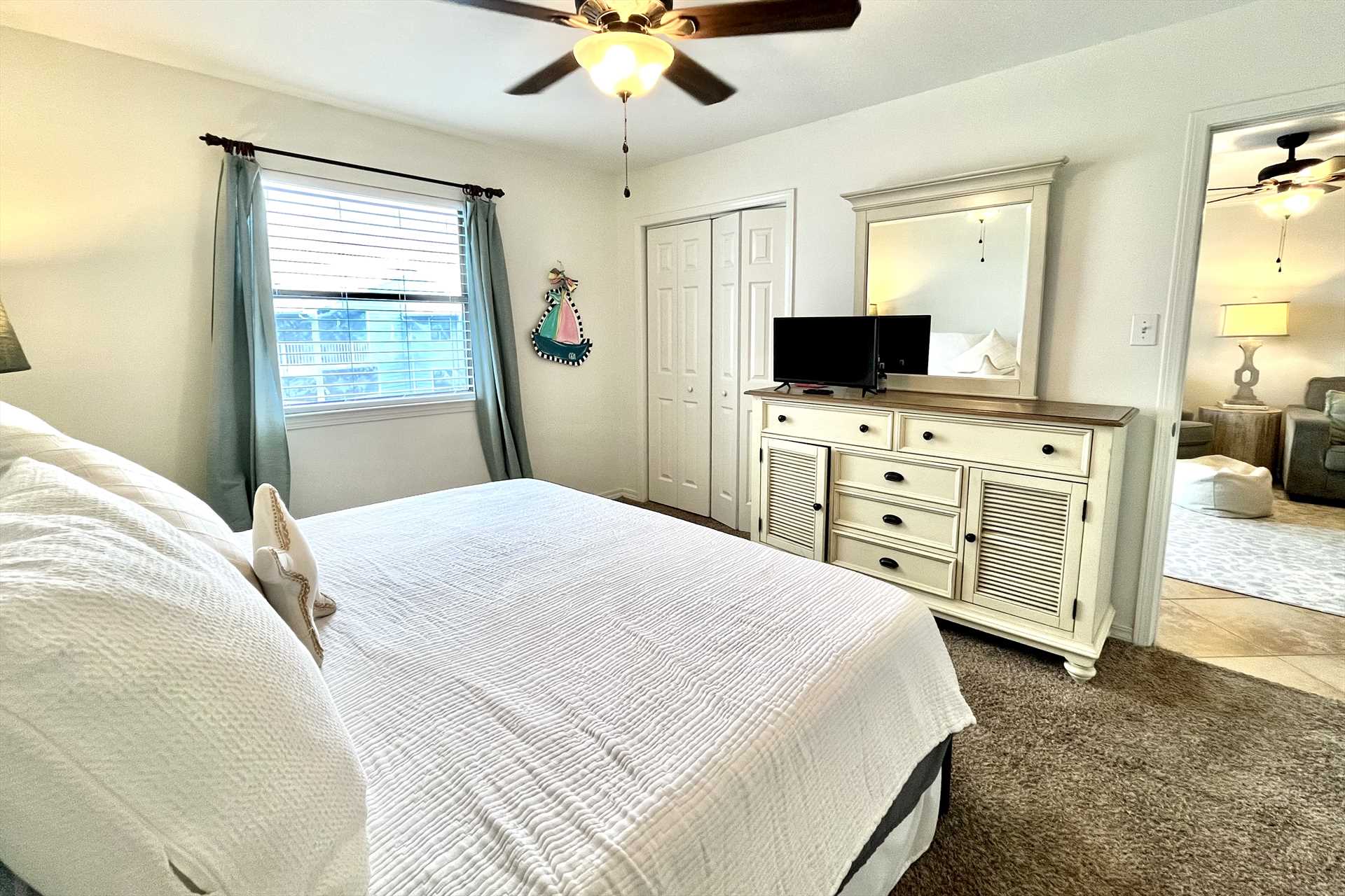 The primary bedroom with attached bathroom.