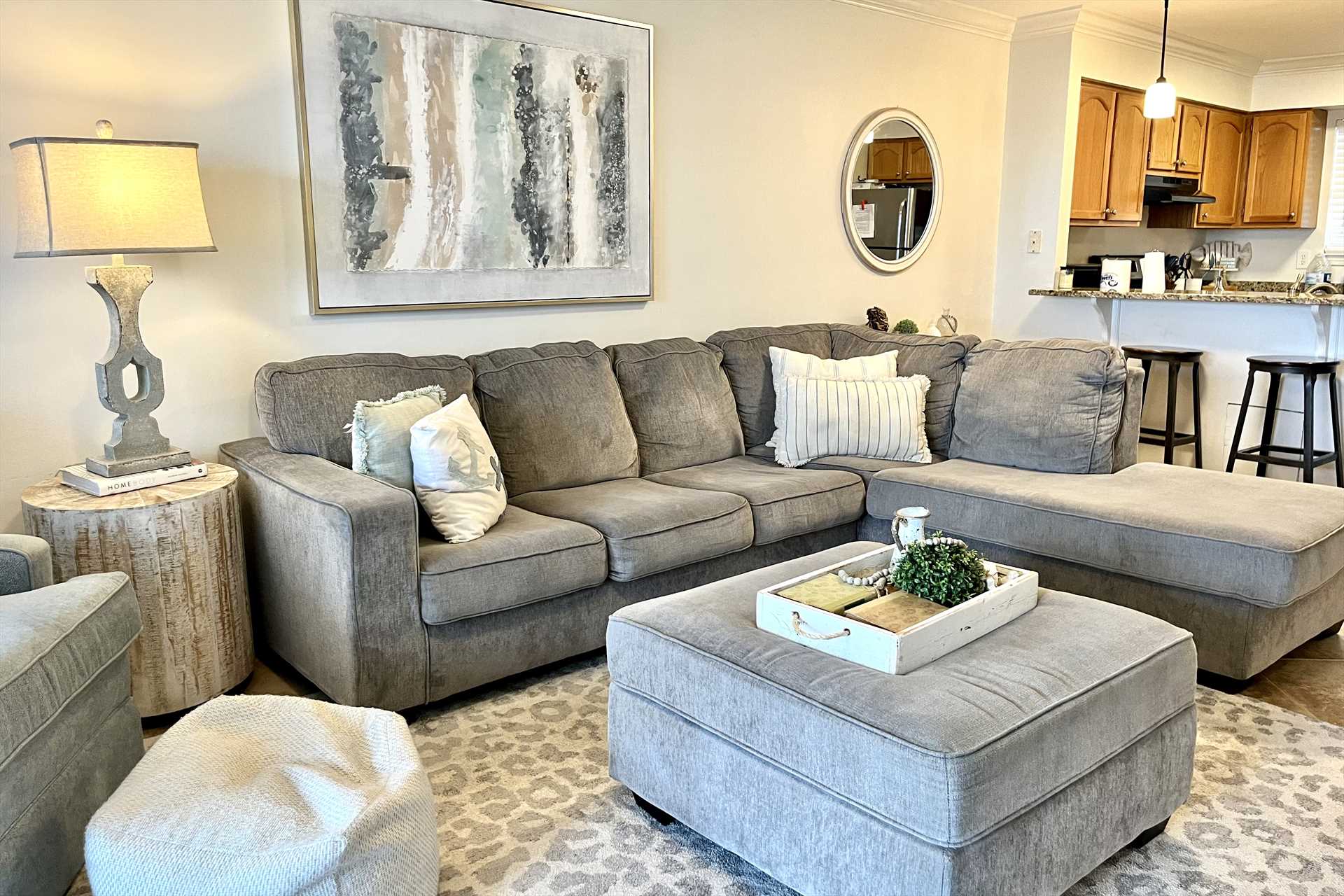 The living room is equipped with sleeper sofa, love seat, an