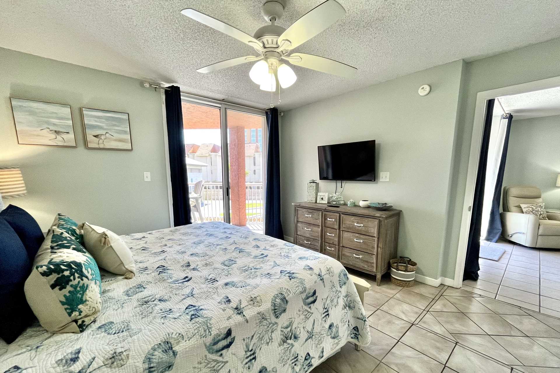 The first bedroom with a smart tv 
