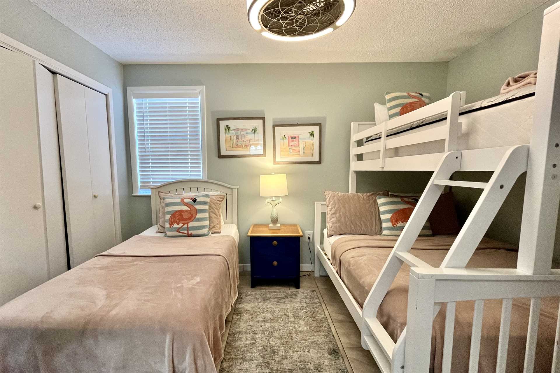 The second bedroom includes a twin over full bunk 
