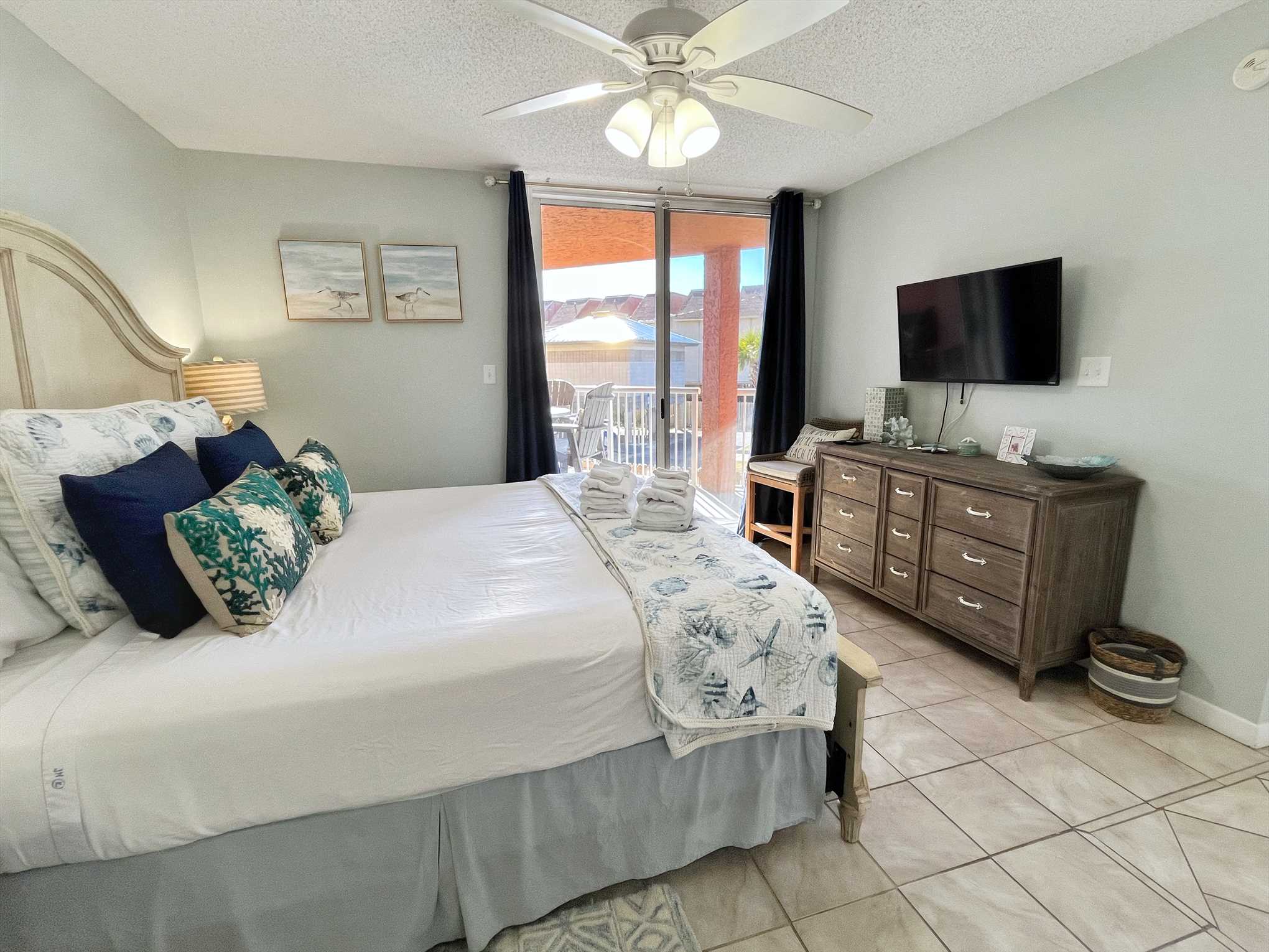 The first bedroom with a smart tv 