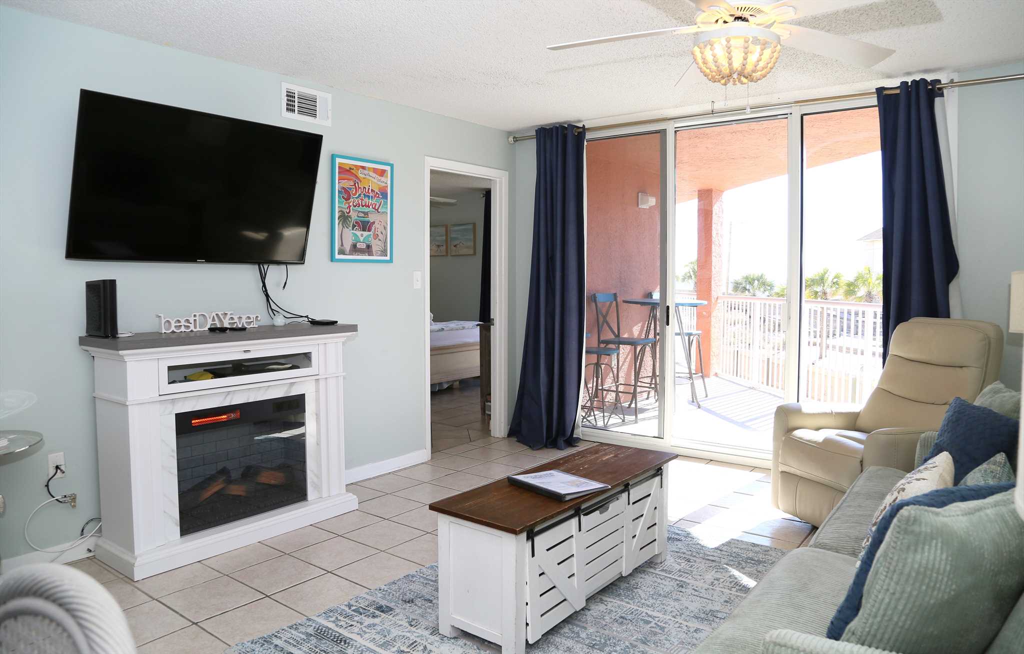 Comfortable living room with electric fireplace.