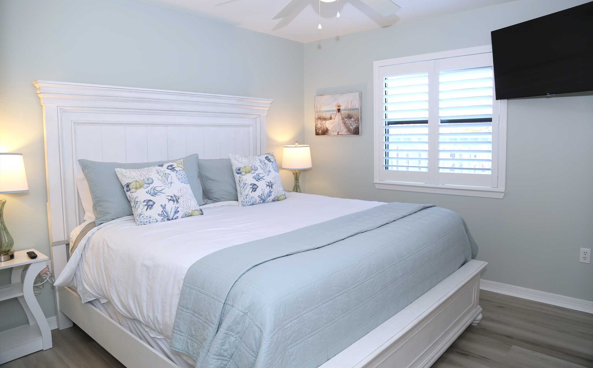 The second bedroom includes a king-size bed.