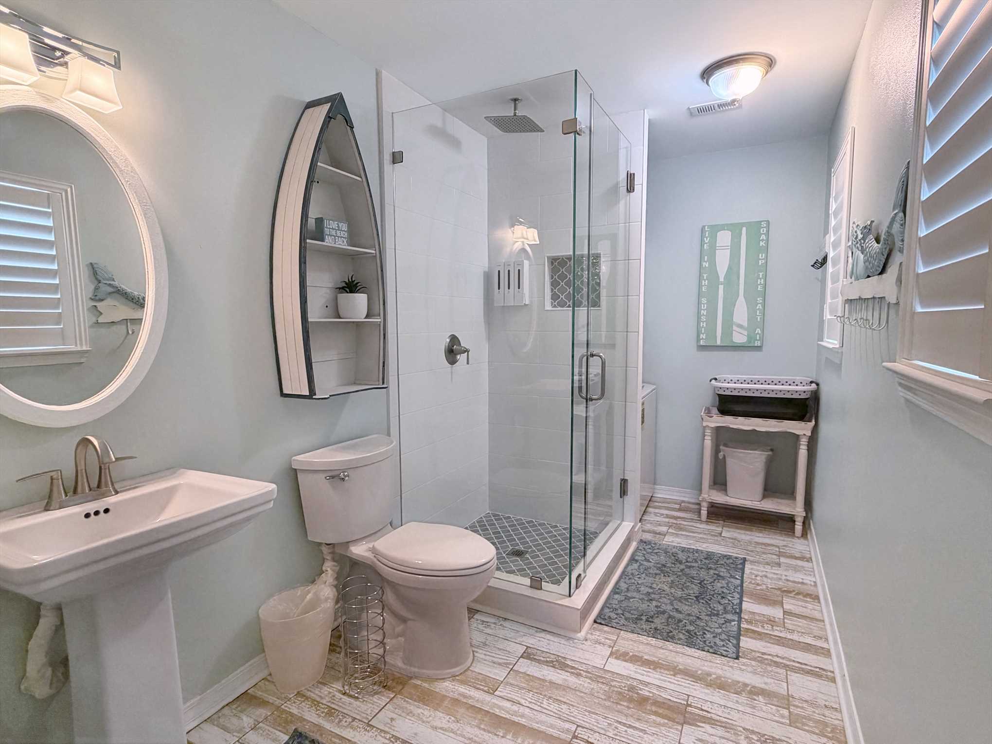 The completely renovated hall bathroom with waterfall shower