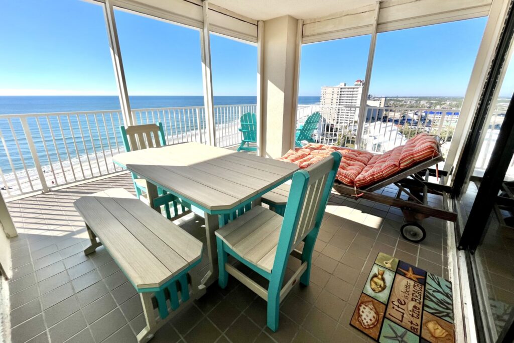 Shoalwater 1106 Orange Beach. The balcony with tables & seating.